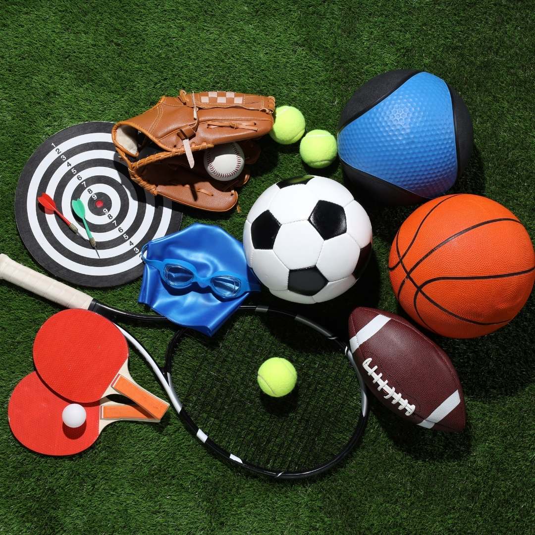 Various sports equipment including football soccer basketball and ping pong